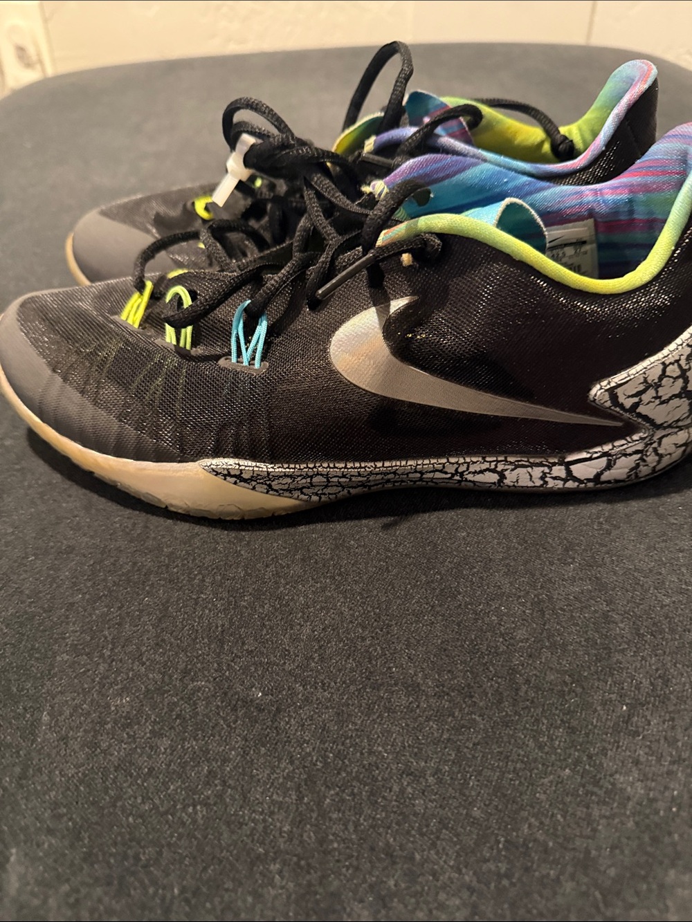 Nike Kids Black Sneakers with White Swoosh and Neon Lining